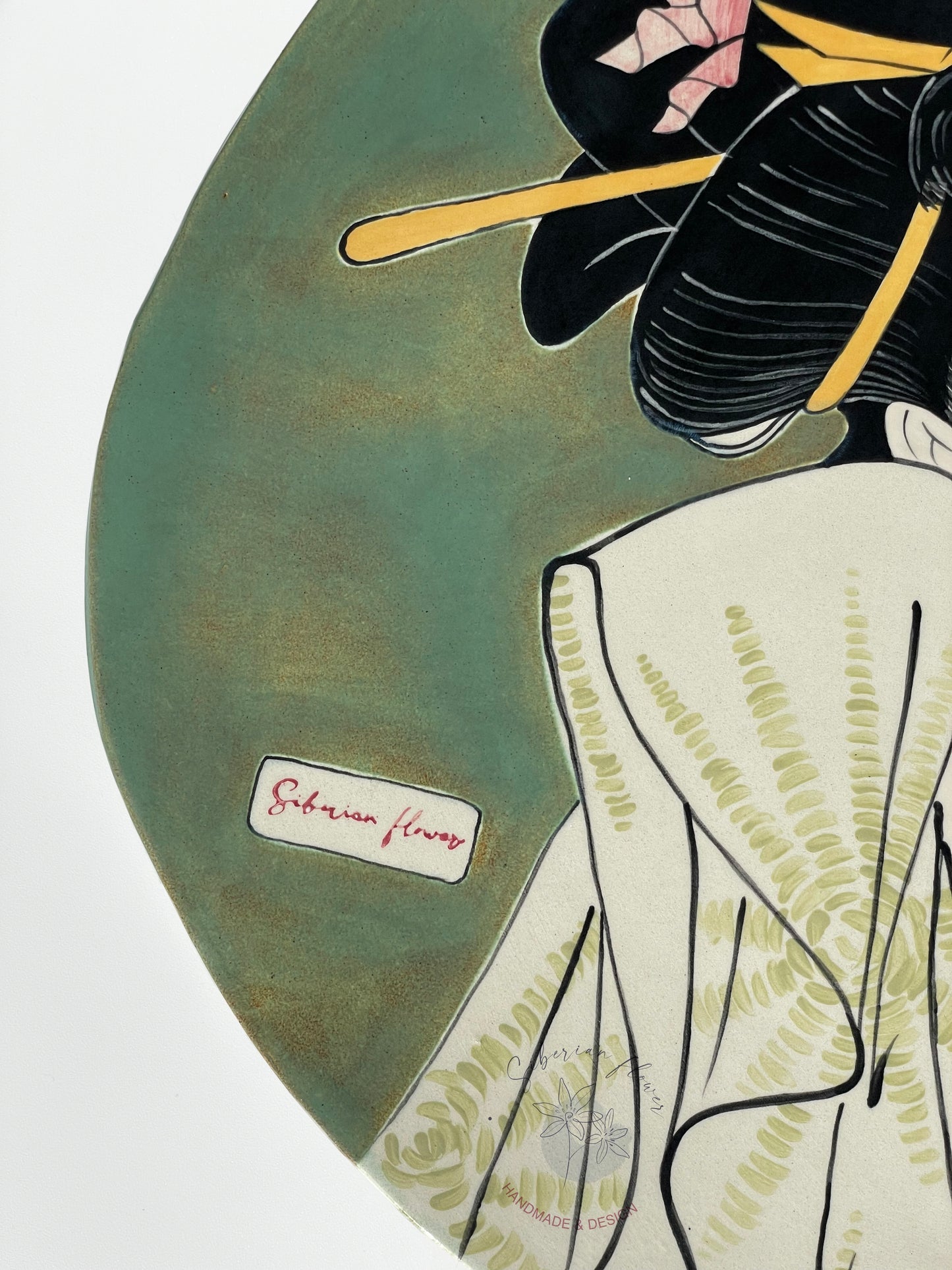 Piatto decorato con Geisha