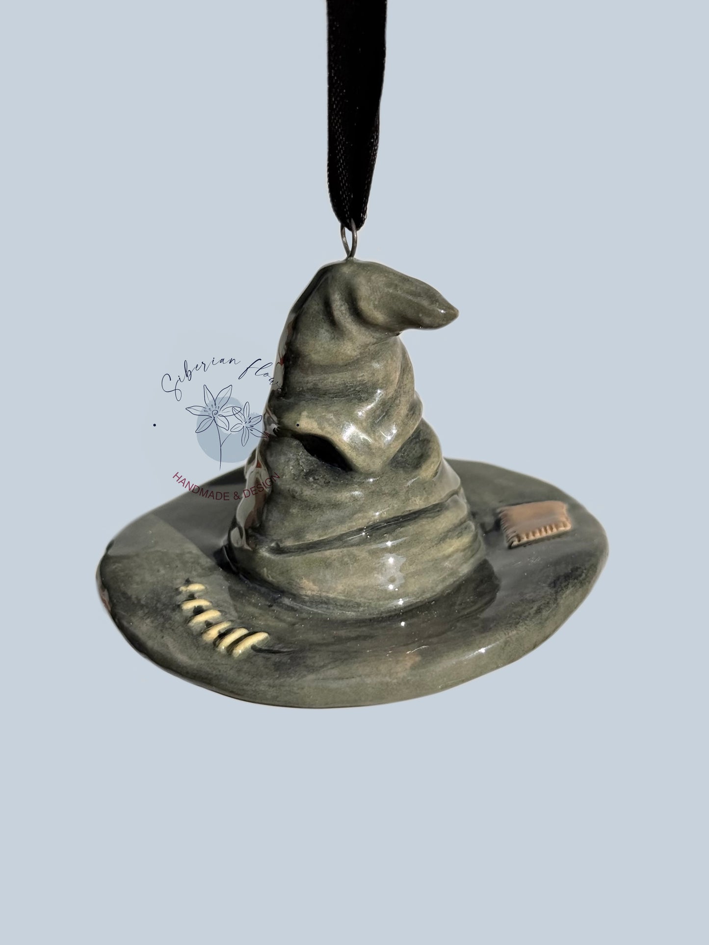 Statuina Cappello Parlante